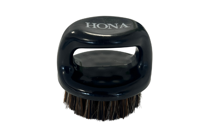 Cepillo suave para polvo de uñas. 